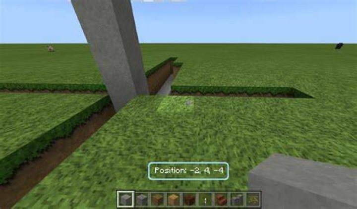 How do I view coordinates in Minecraft: Windows 10 Edition?